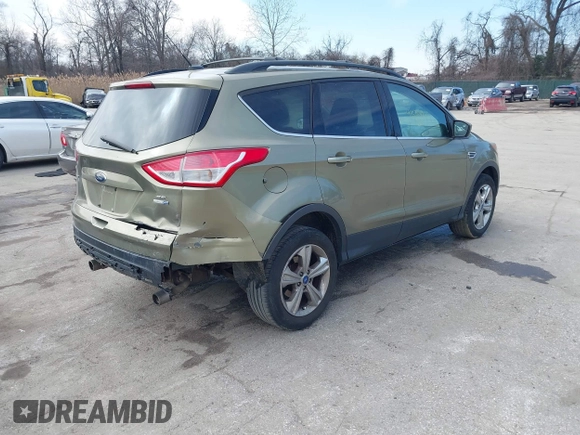 2013 Ford Escape SE with VIN 1FMCU9GX1DUB69236, listed as a IAAI auction lot 41575494 with 122,075 mi miles and . Bid and sale history available at DreamBid. Image 4.