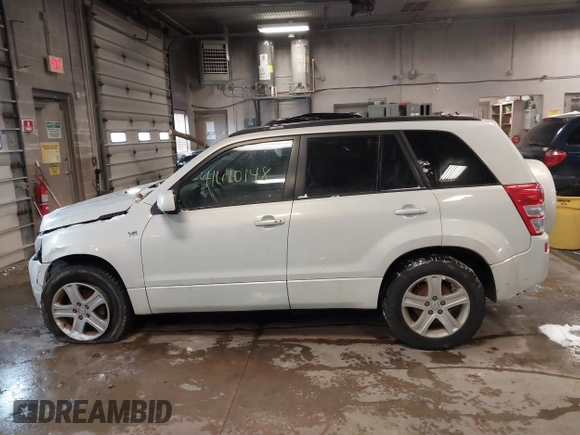 2006 Suzuki Grand Vitara Luxury with VIN JS3TD947764101438, listed as a IAAI auction lot 41610148 with 172,483 mi miles and . Bid and sale history available at DreamBid. Image 15.