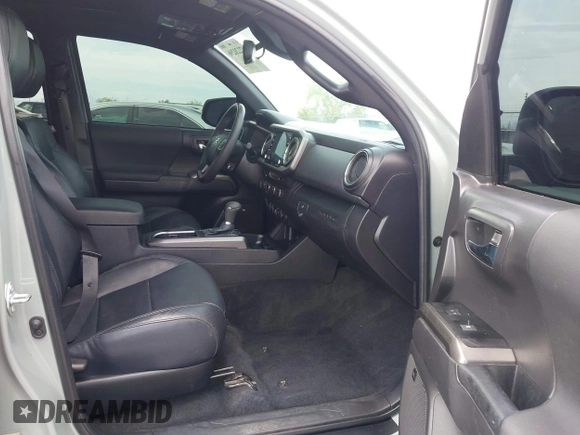 2022 Toyota Tacoma SR with VIN 3TMCZ5AN0NM507320, listed as a IAAI auction lot 42220296 with 33,342 mi miles and . Bid and sale history available at DreamBid. Image 5.