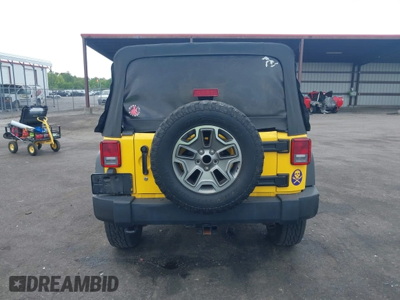 2015 Jeep Wrangler Unlimited Willys Wheeler with VIN 1C4BJWDG2FL643375, listed as a IAAI auction lot 42109724 with 112,357 mi miles and . Bid and sale history available at DreamBid. Image 16.