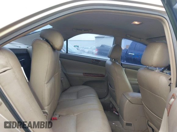 2002 Toyota Camry LE z VIN 4T1BE32K42U592181, wystawiony jako IAAI lot #42206721 z przebiegiem 299 947 mil mil oraz . Historia ofert i sprzedaży dostępna na DreamBid. Obrazek 8.
