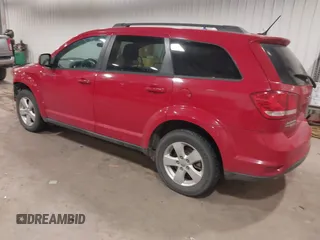 2012 Dodge Journey SXT z VIN 3C4PDDBG4CT397806, wystawiony jako IAAI lot #41333394 z przebiegiem 122 804 mil mil oraz . Historia ofert i sprzedaży dostępna na DreamBid. Obrazek 3.