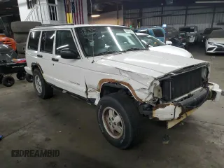 1997 Jeep Cherokee Country with VIN 1J4FJ78S0VL587323, listed as a Copart auction lot 89295355 with 205,432 mi miles and Salvage Title. Bid and sale history available at carsss.com. Image 4.