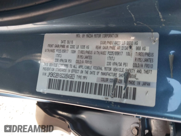 2016 Mazda CX-5 Sport with VIN JM3KE2BY8G0864983, listed as a IAAI auction lot 42072385 with 141,104 mi miles. Bid and sale history available at carsss.com. Image 9.