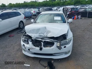 2011 BMW 3 Series 335i with VIN WBAKG7C56BE598702, listed as a IAAI auction lot 42159394 with Not provided miles and . Bid and sale history available at DreamBid. Image 13.