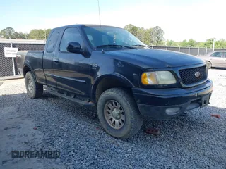 2003 Ford F-150 XL with VIN 2FTRX18L33CA96940, listed as a IAAI auction lot 42090248 with 229,260 mi miles. Bid and sale history available at carsss.com. Image 1.