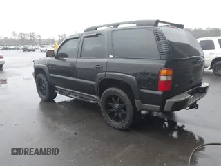 2003 Chevrolet Tahoe LT with VIN 1GNEK13Z73R176597, listed as a IAAI auction lot 41540553 with 275,042 mi miles. Bid and sale history available at carsss.com. Image 3.