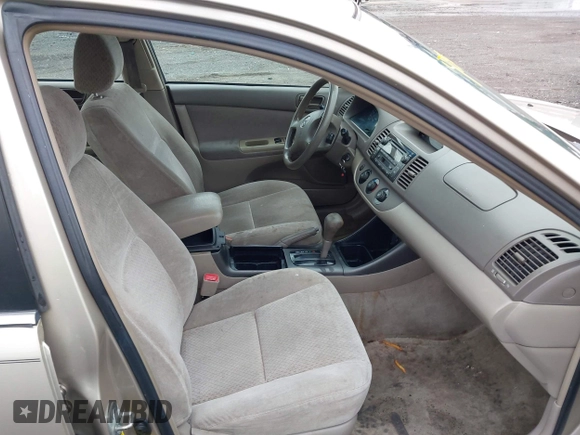 2004 Toyota Camry LE with VIN 4T1BE30KX4U327013, listed as a IAAI auction lot 41987105 with 241,236 mi miles. Bid and sale history available at carsss.com. Image 5.