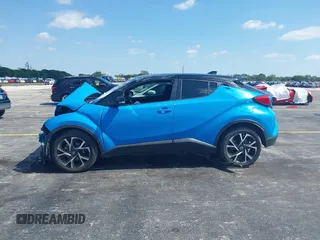 2019 Toyota C-HR XLE with VIN NMTKHMBX6KR097934, listed as a IAAI auction lot 39276687 with 56,973 mi miles. Bid and sale history available at carsss.com. Image 13.