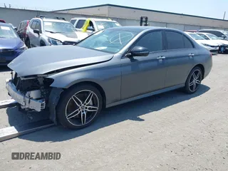 2019 Mercedes-Benz E 300 with VIN WDDZF4JB3KA601824, listed as a IAAI auction lot 42053608 with 54,998 mi miles and . Bid and sale history available at DreamBid. Image 2.