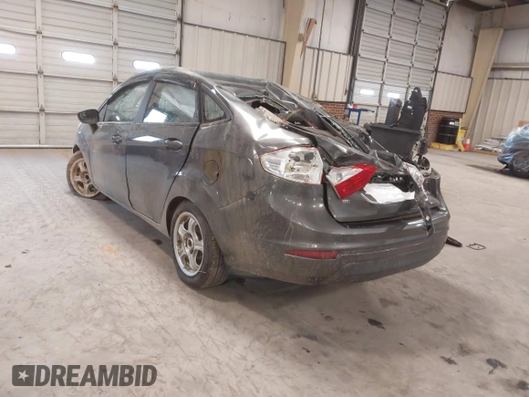 2015 Ford Fiesta SE with VIN 3FADP4BJ7FM218586, listed as a IAAI auction lot 41603479 with 97,460 mi miles. Bid and sale history available at carsss.com. Image 3.