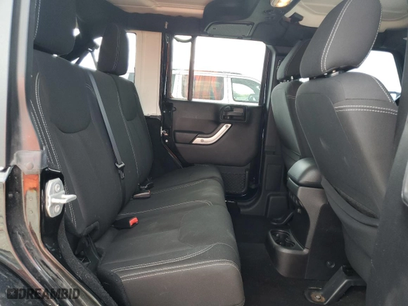 2015 Jeep Wrangler Unlimited Sahara with VIN 1C4BJWEG6FL774968, listed as a Copart auction lot 45646525 with 71,528 mi miles and Salvage Title. Bid and sale history available at carsss.com. Image 12.