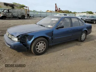 1993 Nissan Maxima z VIN JN1HJ01F8PT075754, wystawiony jako Copart lot #61406264 z przebiegiem 69 379 mil mil oraz Nie do naprawy. Historia ofert i sprzedaży dostępna na DreamBid. Obrazek 1.
