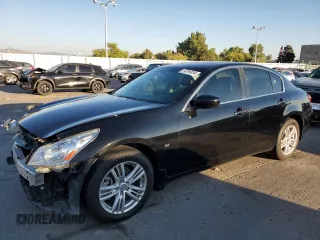2015 Infiniti Q40 with VIN JN1CV6AR8FM524497, listed as a Copart auction lot 74764554 with 83,989 mi miles and Salvage Title. Bid and sale history available at carsss.com. Image 1.