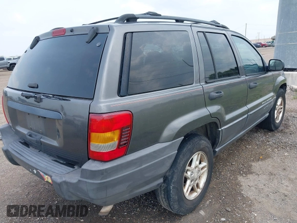 2003 Jeep Grand Cherokee Laredo with VIN 1J4GW48S83C553535, listed as a IAAI auction lot 42387097 with 360,465 mi miles and . Bid and sale history available at DreamBid. Image 4.