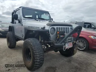 2003 Jeep Wrangler Rubicon z VIN 1J4FA69S53P340085, wystawiony jako Copart lot #74564574 z przebiegiem Nie podano mil oraz Szkoda całkowita • Salvage title. Historia ofert i sprzedaży dostępna na DreamBid. Obrazek 4.