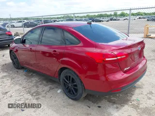 2017 Ford Focus SE z VIN 1FADP3F23HL313857, wystawiony jako IAAI lot #42181530 z przebiegiem 93 478 mil mil oraz . Historia ofert i sprzedaży dostępna na DreamBid. Obrazek 3.