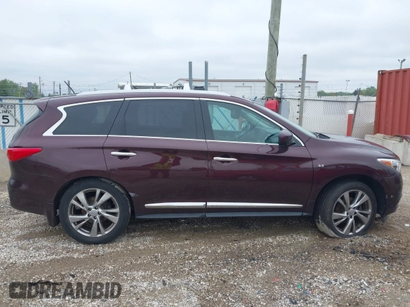 2015 Infiniti QX60 with VIN 5N1AL0MM7FC521700, listed as a IAAI auction lot 42310389 with 144,217 mi miles and . Bid and sale history available at DreamBid. Image 13.