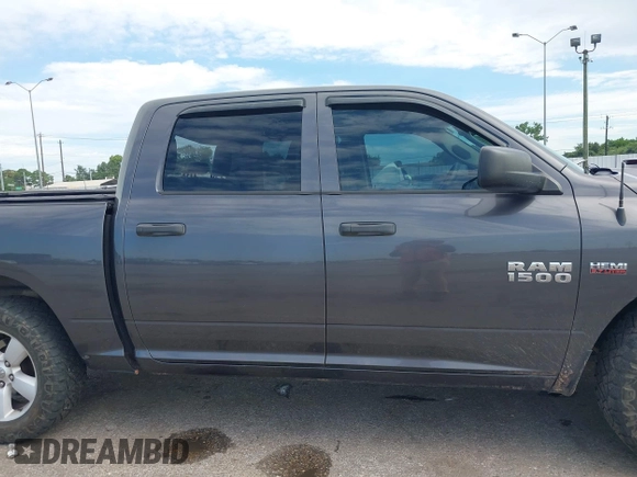 2014 Ram 1500 Express with VIN 1C6RR6KTXES272212, listed as a IAAI auction lot 42452271 with 140,854 mi miles and . Bid and sale history available at DreamBid. Image 13.