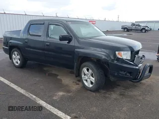 2011 Honda Ridgeline RTL with VIN 5FPYK1F53BB001385, listed as a IAAI auction lot 41945219 with 168,713 mi miles and . Bid and sale history available at DreamBid. Image 1.