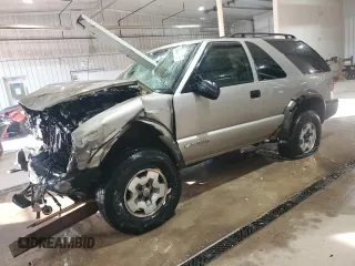 2004 Chevrolet Blazer LS z VIN 1GNCT18X34K143280, wystawiony jako Copart lot #50494785 z przebiegiem Nie podano mil oraz Szkoda całkowita • Salvage title. Historia ofert i sprzedaży dostępna na DreamBid. Obrazek 1.