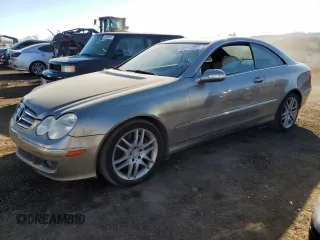 2009 Mercedes-Benz CLK-Class 3.5L with VIN WDBTJ56H89F270509, listed as a Copart auction lot 42214585 with 67,116 mi miles and Salvage Title. Bid and sale history available at carsss.com. Image 1.