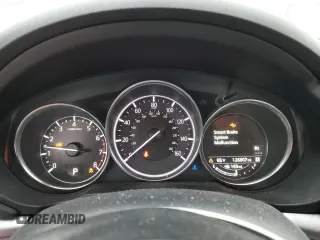 2017 Mazda CX-5 Touring with VIN JM3KFBCLXH0124451, listed as a Copart auction lot 51060275 with 126,807 mi miles and Salvage Title. Bid and sale history available at carsss.com. Image 9.
