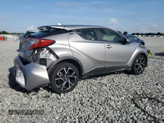 2018 Toyota C-HR XLE z VIN JTNKHMBX5J1000814, wystawiony jako Copart lot #57891045 z przebiegiem 80 466 mil mil oraz Szkody całkowita. Historia ofert i sprzedaży dostępna na DreamBid. Obrazek 3.