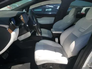 2016 Tesla Model X 70D with VIN 5YJXCAE28GF017100, listed as a Copart auction lot 50081235 with 126,962 mi miles and Salvage Title. Bid and sale history available at DreamBid. Image 7.