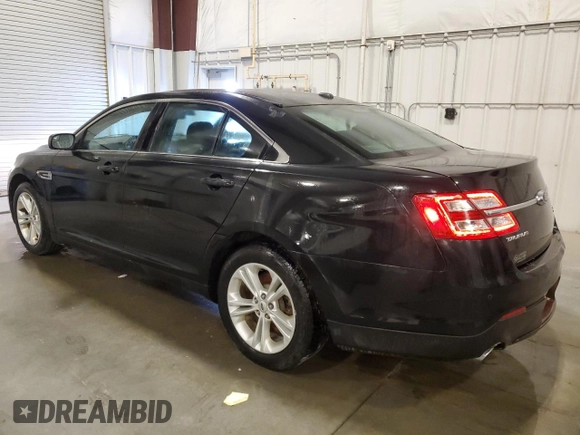 2014 Ford Taurus SEL z VIN 1FAHP2E82EG186640, wystawiony jako Copart lot #55820205 z przebiegiem 194 843 mil mil oraz Czysty tytuł • Clean title. Historia ofert i sprzedaży dostępna na DreamBid. Obrazek 2.