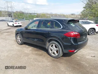 2011 Porsche Cayenne S Hybrid with VIN WP1AE2A27BLA91799, listed as a IAAI auction lot 42035613 with 131,480 mi miles. Bid and sale history available at carsss.com. Image 3.