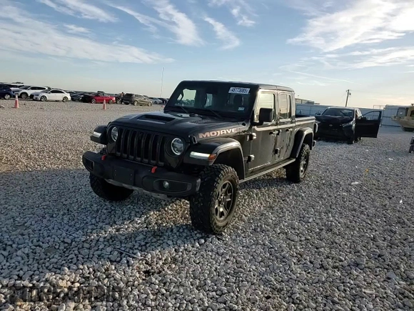 2020 Jeep Gladiator Mojave z VIN 1C6JJTEG9LL205738, wystawiony jako Copart lot #48773085 z przebiegiem 18 649 mil mil oraz Szkoda całkowita • Salvage title. Historia ofert i sprzedaży dostępna na DreamBid. Obrazek 10.