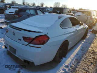 2014 BMW M6 z VIN WBSLX9C51ED160286, wystawiony jako Copart lot #38369134 z przebiegiem Nie podano mil oraz Szkody całkowita. Historia ofert i sprzedaży dostępna na DreamBid. Obrazek 3.