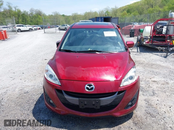 2012 Mazda 5 Grand Touring with VIN JM1CW2DL1C0123418, listed as a IAAI auction lot 42126956 with 112,411 mi miles and . Bid and sale history available at DreamBid. Image 12.