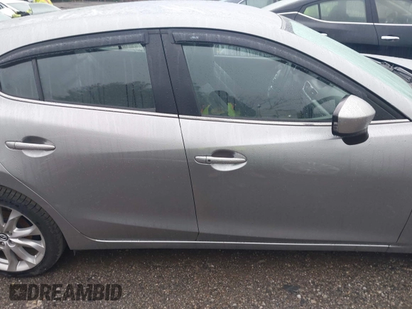 2014 Mazda 3 S Touring with VIN JM1BM1L30E1187539, listed as a IAAI auction lot 41974709 with 111,189 mi miles and . Bid and sale history available at DreamBid. Image 13.