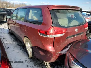 2012 Toyota Sienna with VIN 5TDKA3DC2CS014043, listed as a Copart auction lot 44439585 with 294,361 mi miles and Clean Title. Bid and sale history available at DreamBid. Image 2.