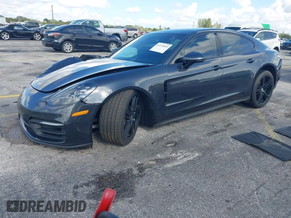 2021 Porsche Panamera с VIN WP0AJ2A76ML121032, выставлен на аукционе IAAI как лот 41215053 с пробегом Не указан миль и . История ставок и продаж доступна на DreamBid. Изображение 2.