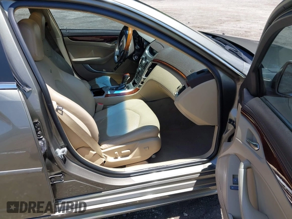 2010 Cadillac CTS Luxury with VIN 1G6DF5EG7A0110647, listed as a IAAI auction lot 42318842 with 243,152 mi miles and . Bid and sale history available at DreamBid. Image 5.