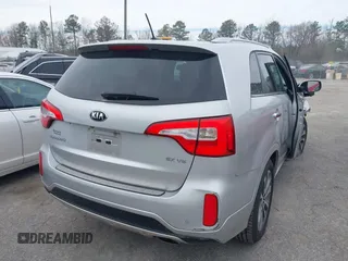 2015 Kia Sorento SX with VIN 5XYKWDA73FG633458, listed as a IAAI auction lot 41728711 with 74,160 mi miles. Bid and sale history available at carsss.com. Image 4.