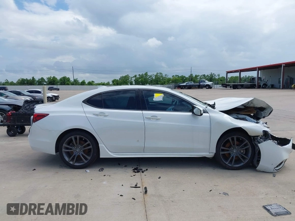 2019 Acura TLX w/A-Spec Pkg z VIN 19UUB2F62KA007114, wystawiony jako IAAI lot #42444291 z przebiegiem 164 795 mil mil oraz . Historia ofert i sprzedaży dostępna na DreamBid. Obrazek 13.
