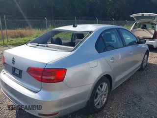 2015 Volkswagen Jetta S with VIN 3VW2K7AJ5FM251943, listed as a IAAI auction lot 42482891 with 74,649 mi miles and . Bid and sale history available at DreamBid. Image 4.