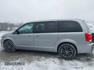 2018 Dodge Grand Caravan SE Plus with VIN 2C4RDGBG2JR254945, listed as a IAAI auction lot 41716809 with 99,404 mi miles and . Bid and sale history available at DreamBid. Image 14.