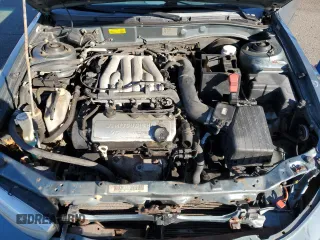 2000 Mitsubishi Galant LS with VIN 4A3AA56LXYE174881, listed as a Copart auction lot 79727154 with 106,001 mi miles and Salvage Title. Bid and sale history available at carsss.com. Image 11.