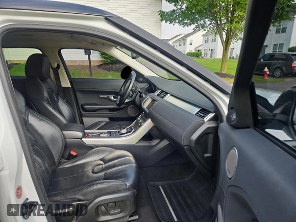 2014 Land Rover Range Rover Evoque Pure Premium z VIN SALVR2BG8EH863485, wystawiony jako Copart lot #57249785 z przebiegiem 133 937 mil mil oraz Czysty tytuł • Clean title. Historia ofert i sprzedaży dostępna na DreamBid. Obrazek 5.