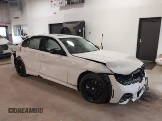 2021 BMW 3 Series 330i xDrive with VIN 3MW5R7J03M8C00737, listed as a IAAI auction lot 41589608 with 17,932 mi miles. Bid and sale history available at carsss.com. Image 1.