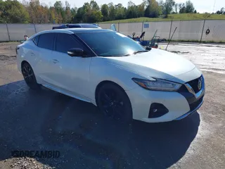 2019 Nissan Maxima Platinum z VIN 1N4AA6AVXKC376971, wystawiony jako IAAI lot #40883771 z przebiegiem 69 853 mil mil oraz . Historia ofert i sprzedaży dostępna na DreamBid. Obrazek 1.