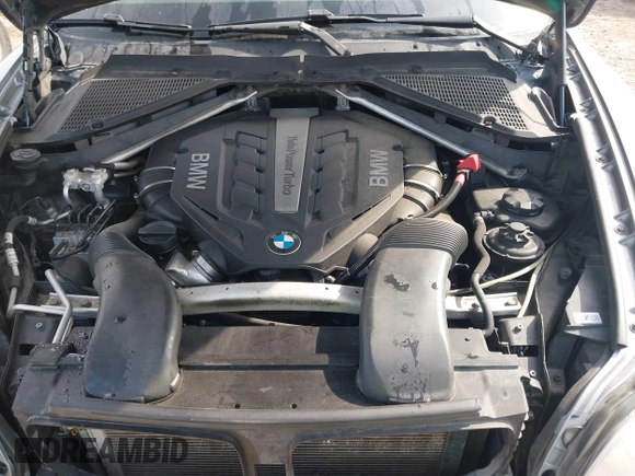 2012 BMW X5 50i with VIN 5UXZV8C56CL426081, listed as a IAAI auction lot 42084071 with 135,473 mi miles and . Bid and sale history available at DreamBid. Image 10.