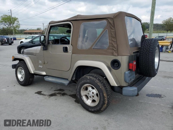 2003 Jeep Wrangler Sahara with VIN 1J4FA59S13P312830, listed as a Copart auction lot 52730955 with 99,247 mi miles and Salvage title. Bid and sale history available at DreamBid. Image 2.