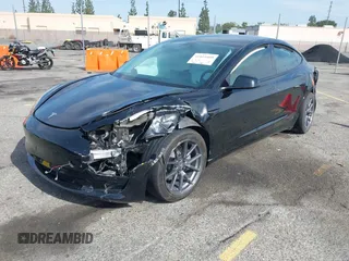 2022 Tesla Model 3 Long Range with VIN 5YJ3E1EB6NF233131, listed as a IAAI auction lot 41819409 with 38,308 mi miles and . Bid and sale history available at DreamBid. Image 19.