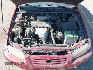 1997 Toyota Camry LE z VIN 4T1BG22K1VU113126, wystawiony jako IAAI lot #42257715 z przebiegiem 177 605 mil mil oraz . Historia ofert i sprzedaży dostępna na DreamBid. Obrazek 10.